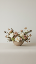 Sculpted mixed bloom centerpiece in oat cream stoneware
